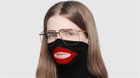 gucci black face sweater comes in other colors|gucci sweater controversy.